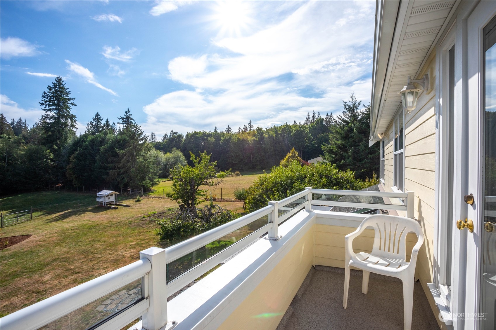 633 Kline Road Bellingham, WA 98226 - Photo 19 of 40 a view of a chairs and table in the balcony