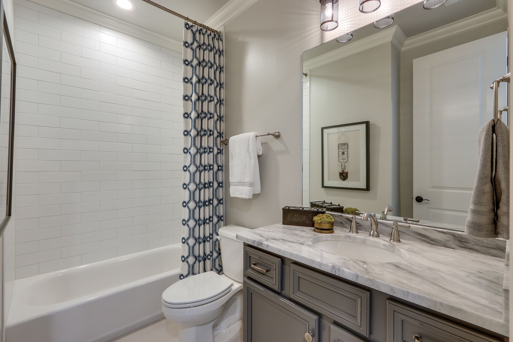 513 Rowan Street Franklin, TN 37064 - Photo 30 of 36 a bathroom with a granite countertop sink a toilet and a large mirror