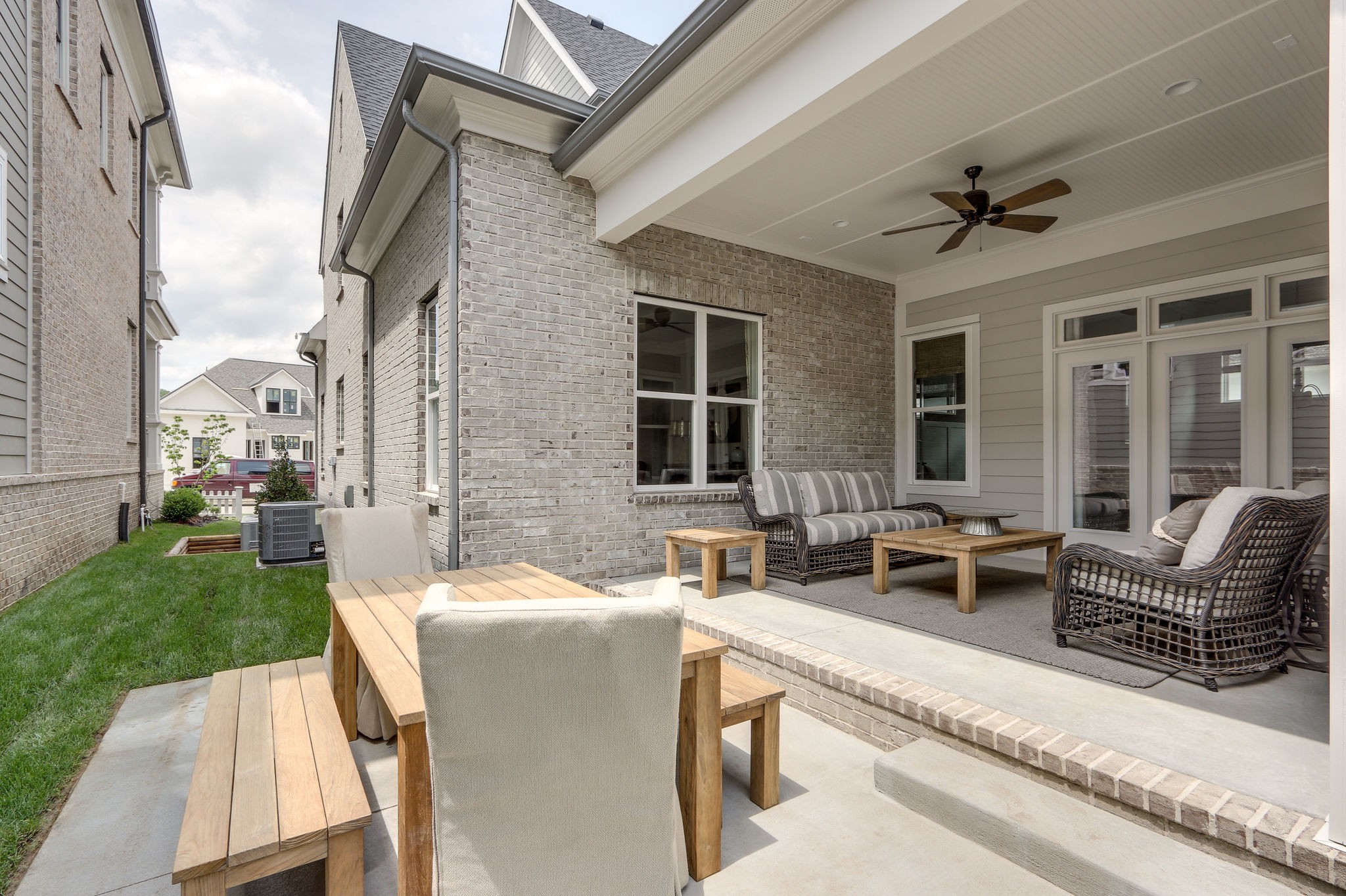 513 Rowan Street Franklin, TN 37064 - Photo 35 of 36 a view of a patio with couches chairs and potted plants
