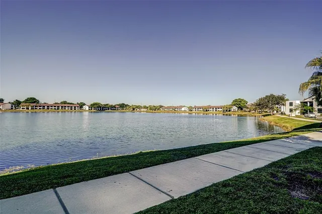 a view of a lake with a big yard