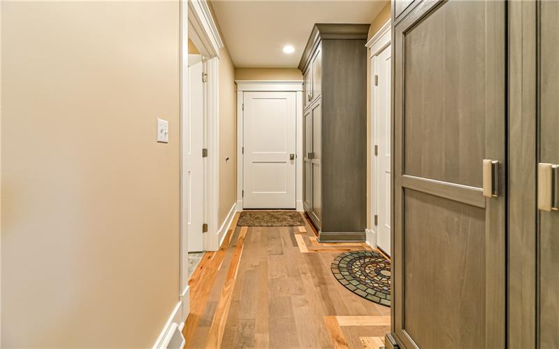 309 Parkhill Road Baden, PA 15005 - Photo 7 of 25 Oversize walk in pantry off of kitchen with two large cabinets offer tons of storage space. Access to garage and deck from this room as well.