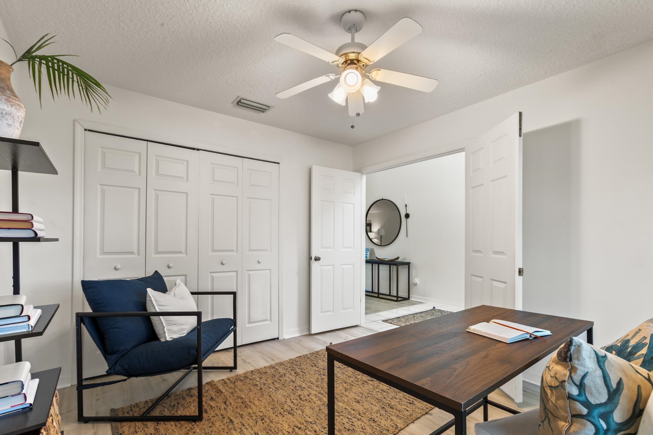 541 Peninsula Court St. Augustine, FL 32080 - Photo 12 of 63 a view of a room with furniture and wooden floor