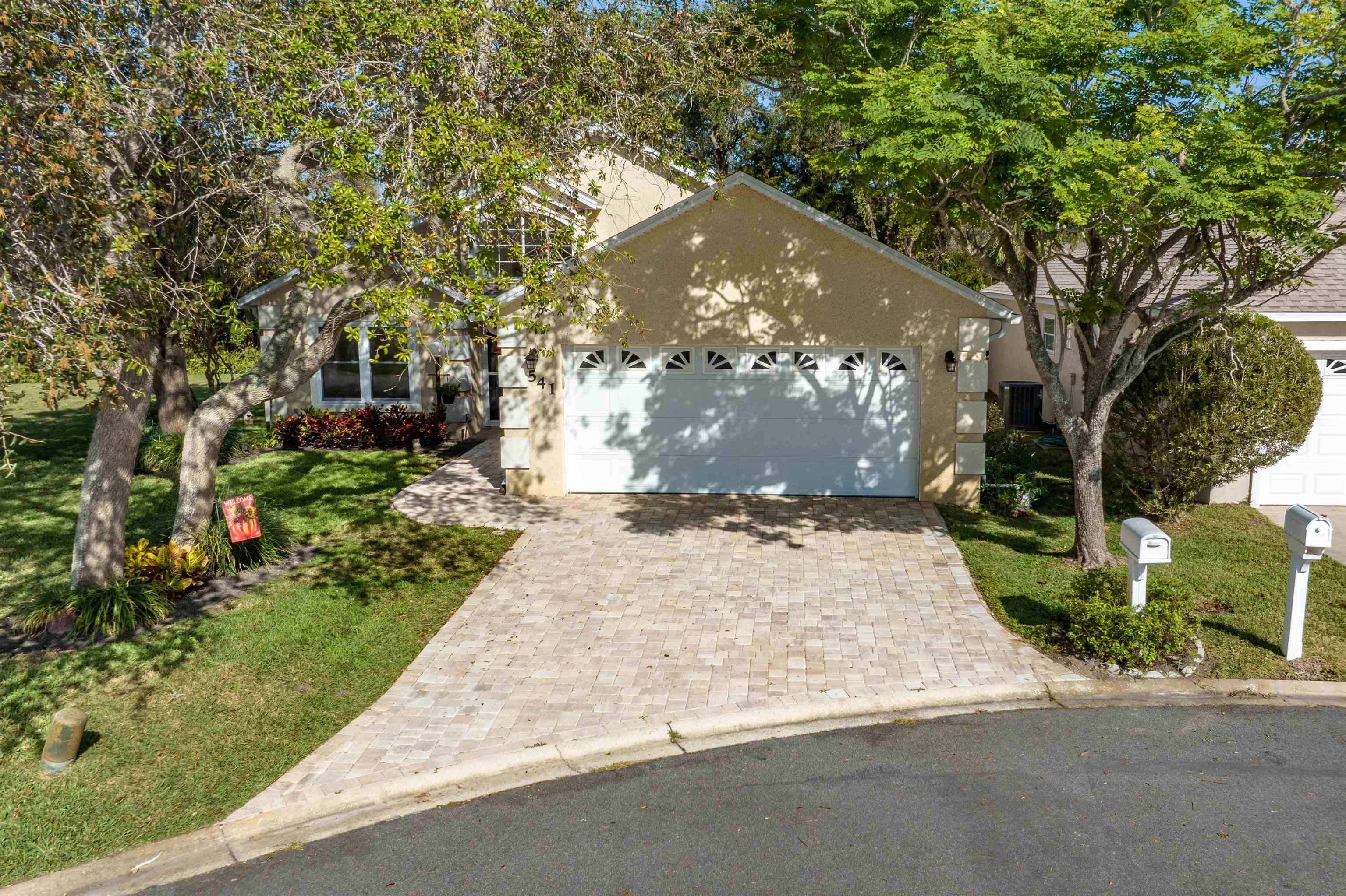 541 Peninsula Court St. Augustine, FL 32080 - Photo 2 of 63 a view of a yard