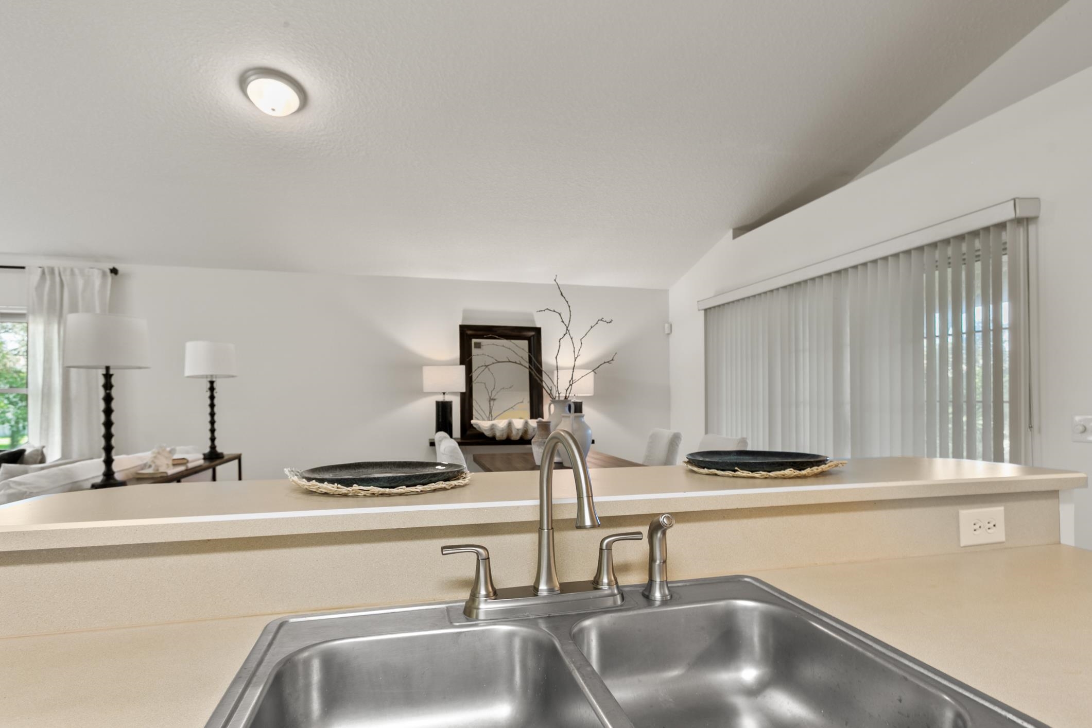 541 Peninsula Court St. Augustine, FL 32080 - Photo 29 of 63 a kitchen with a sink and a stove top oven