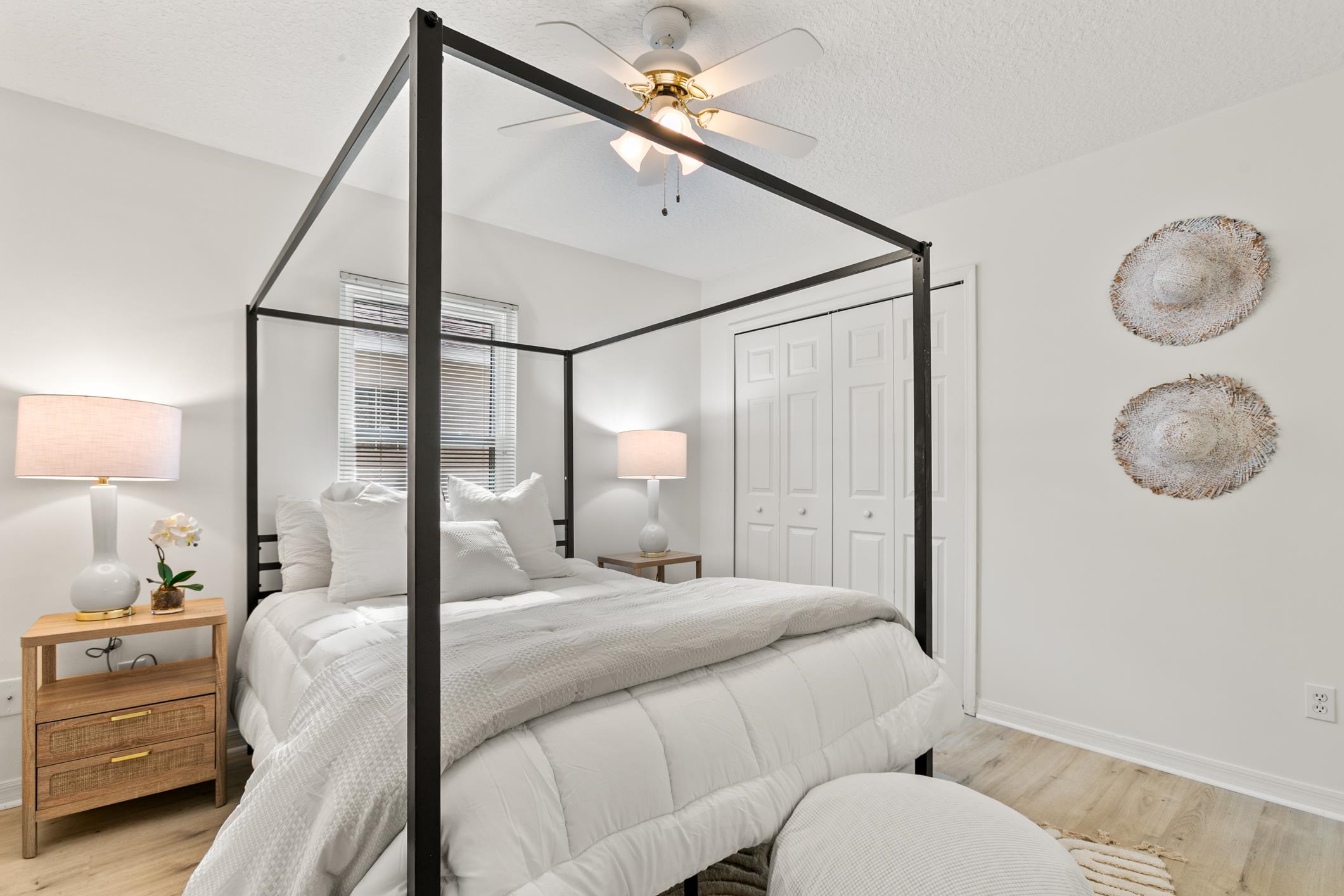 541 Peninsula Court St. Augustine, FL 32080 - Photo 45 of 63 a bedroom with a bed and chandelier