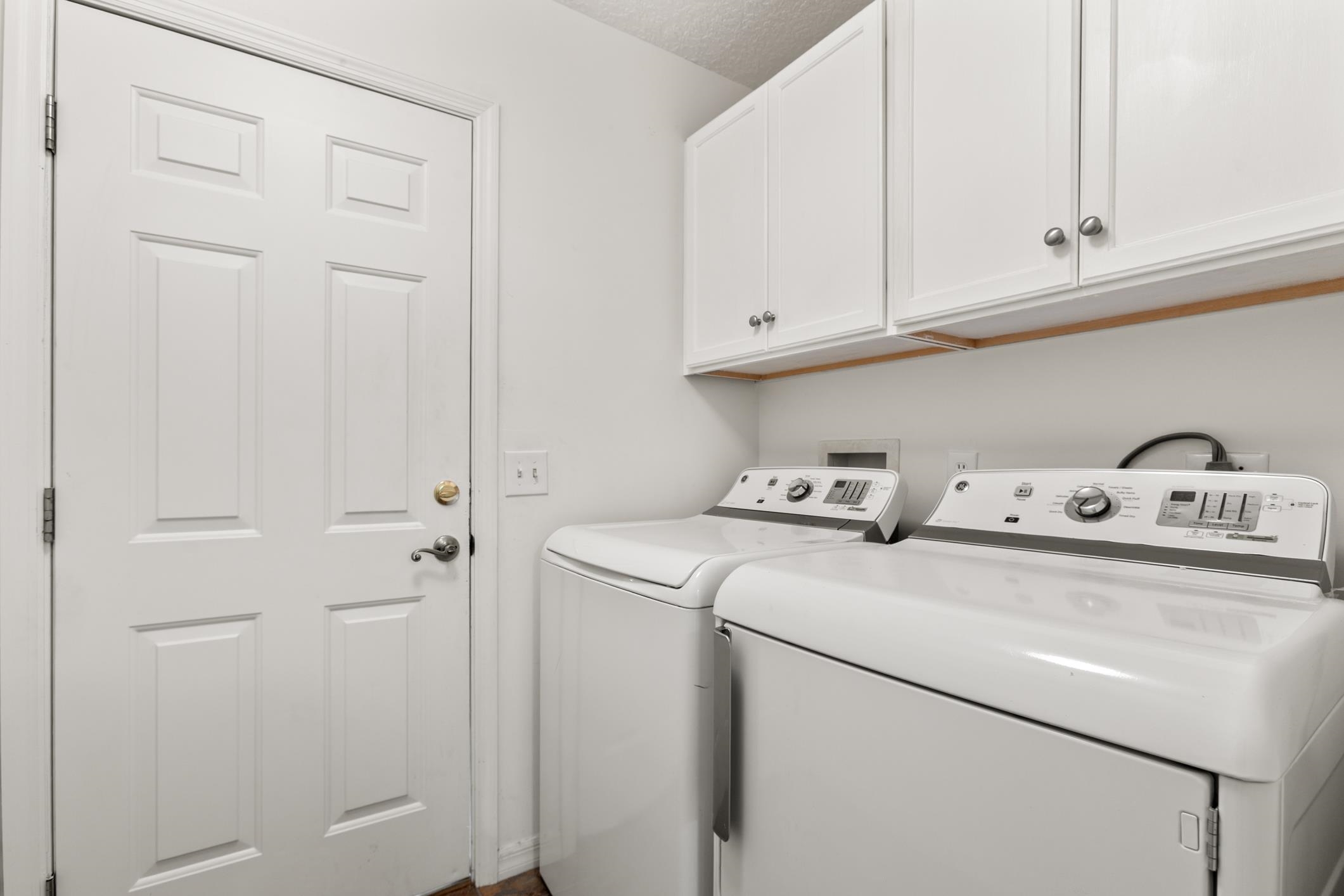 541 Peninsula Court St. Augustine, FL 32080 - Photo 49 of 63 a utility room with dryer and washer