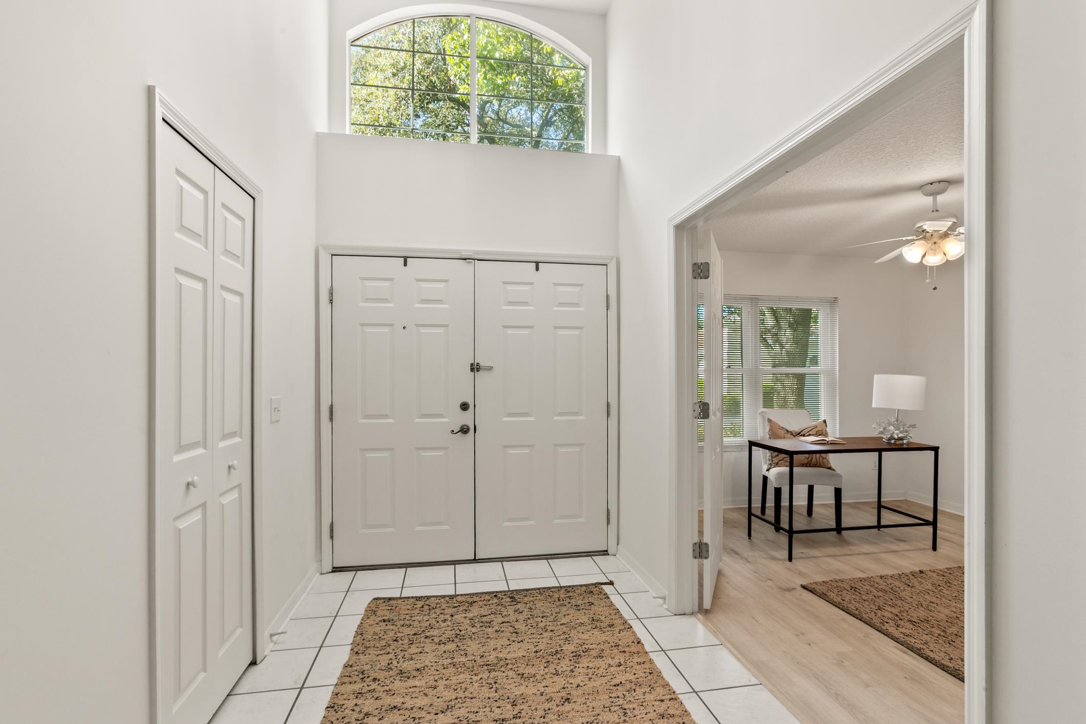 541 Peninsula Court St. Augustine, FL 32080 - Photo 9 of 63 a view of a hallway with a livingroom and dining room