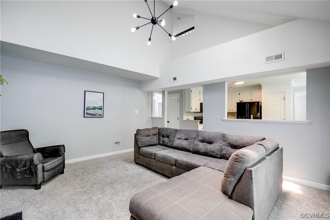 5709 Ridge Point Court Midlothian, VA 23112 - Photo 22 of 40 a living room with furniture and a couch
