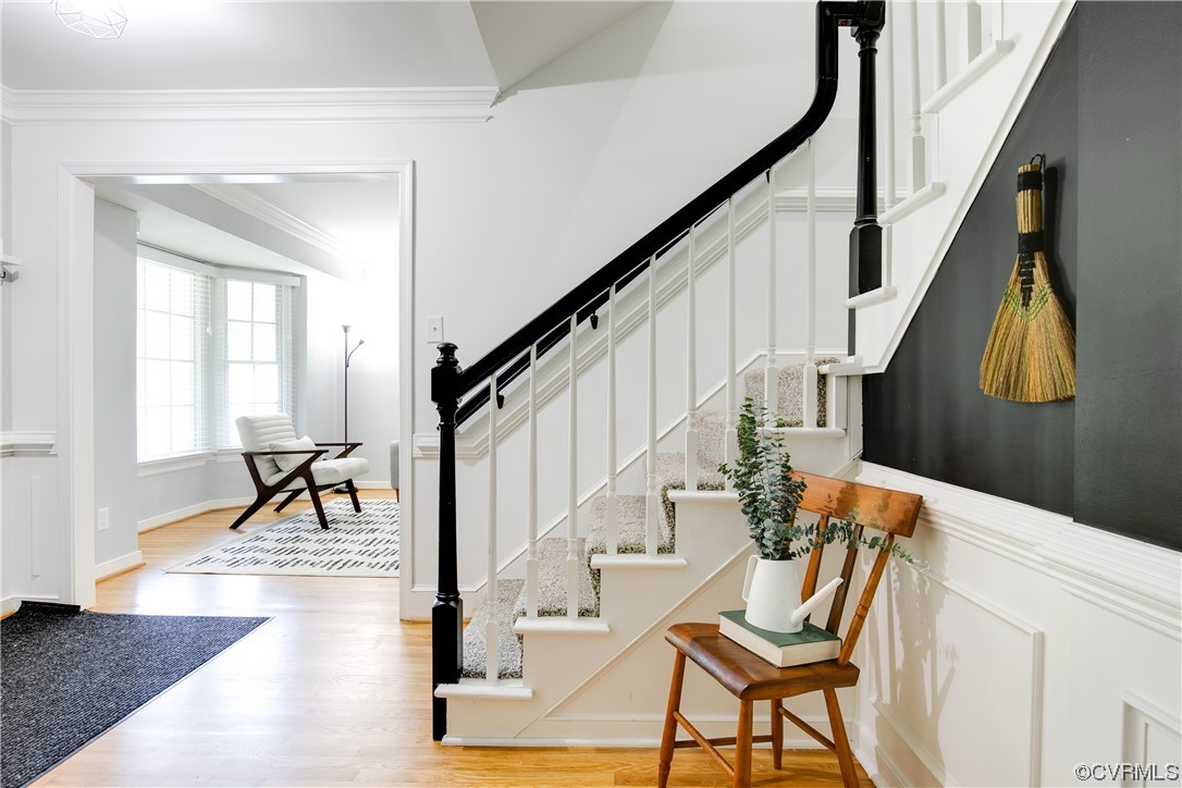 5709 Ridge Point Court Midlothian, VA 23112 - Photo 4 of 40 a view of entryway and hall with wooden floor and furniture