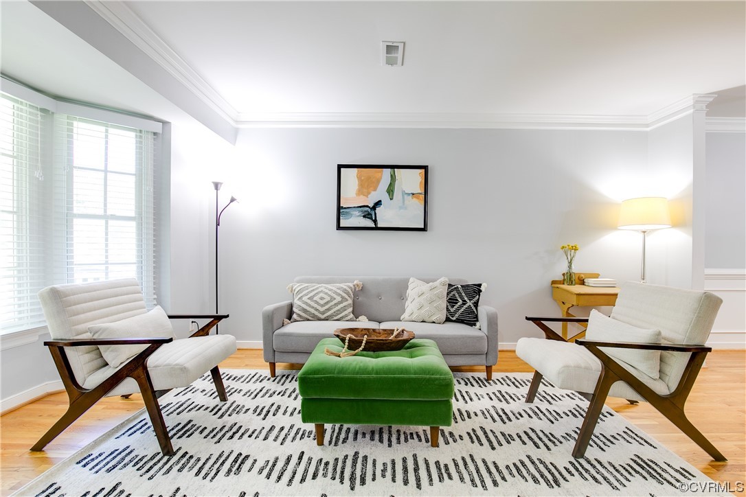 5709 Ridge Point Court Midlothian, VA 23112 - Photo 5 of 40 a living room with a couch and a window