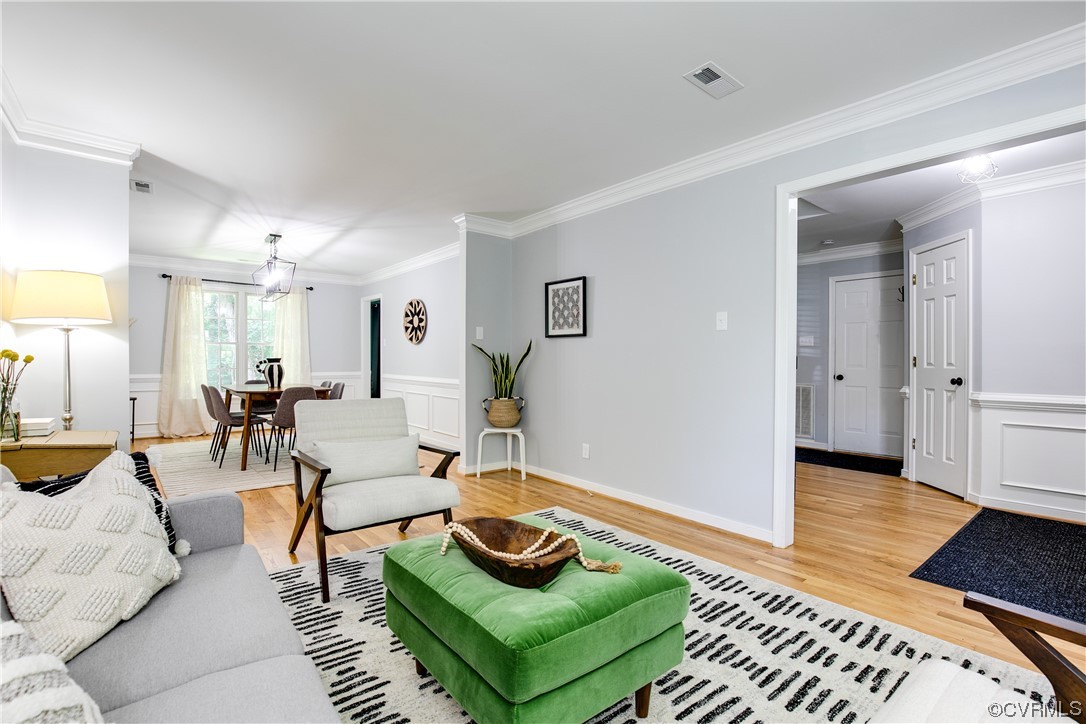 5709 Ridge Point Court Midlothian, VA 23112 - Photo 8 of 40 a living room with furniture and a rug