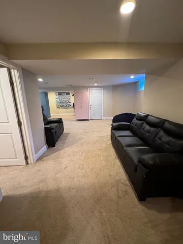 a living room with furniture and a couch