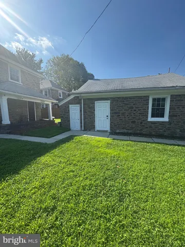 a view of a house with a garden