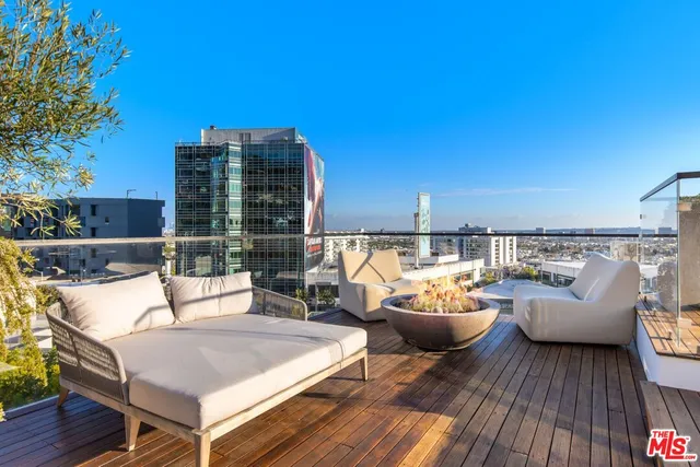 a terrace view with seating space and potted plants