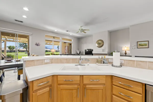 a bathroom with a sink double vanity and a mirror