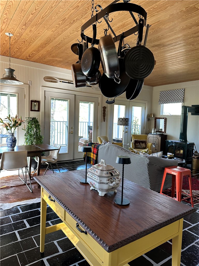 215 Ridge Road Westminster, SC 29693 - Photo 11 of 42 Charming "Island" table and pot rack add function and storage