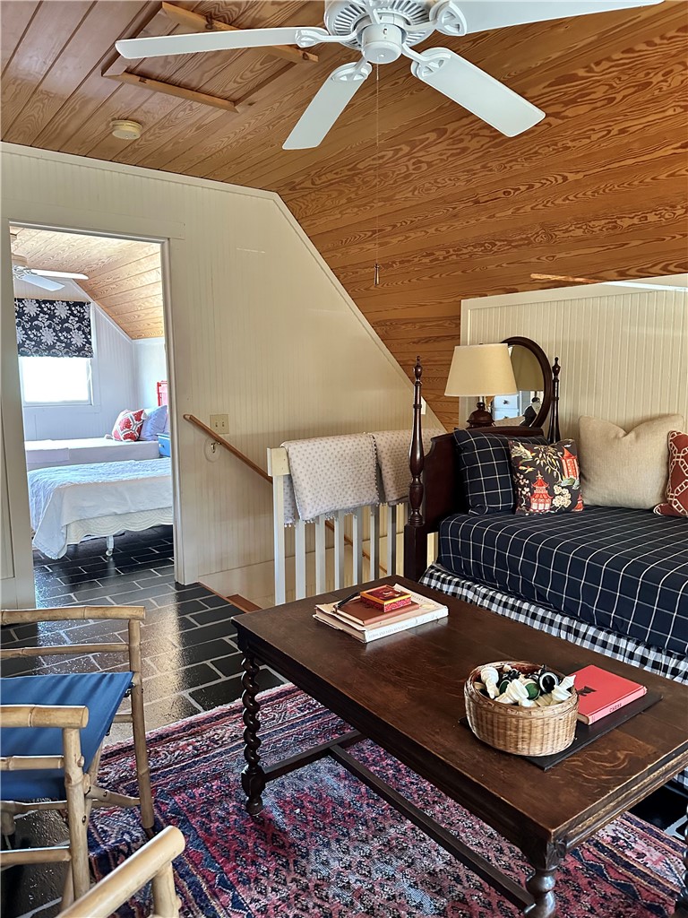 215 Ridge Road Westminster, SC 29693 - Photo 25 of 42 At the top of the stairs, the bedroom loft creates a cozy retreat