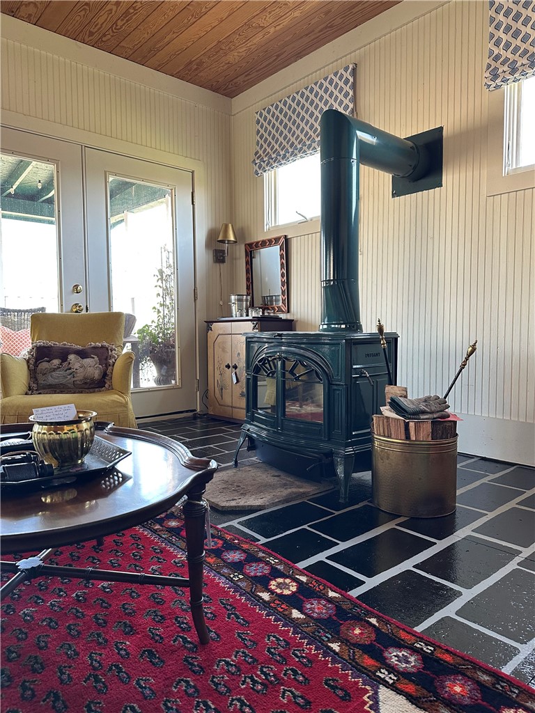 215 Ridge Road Westminster, SC 29693 - Photo 8 of 42 The green wood stove is a show-stopper!