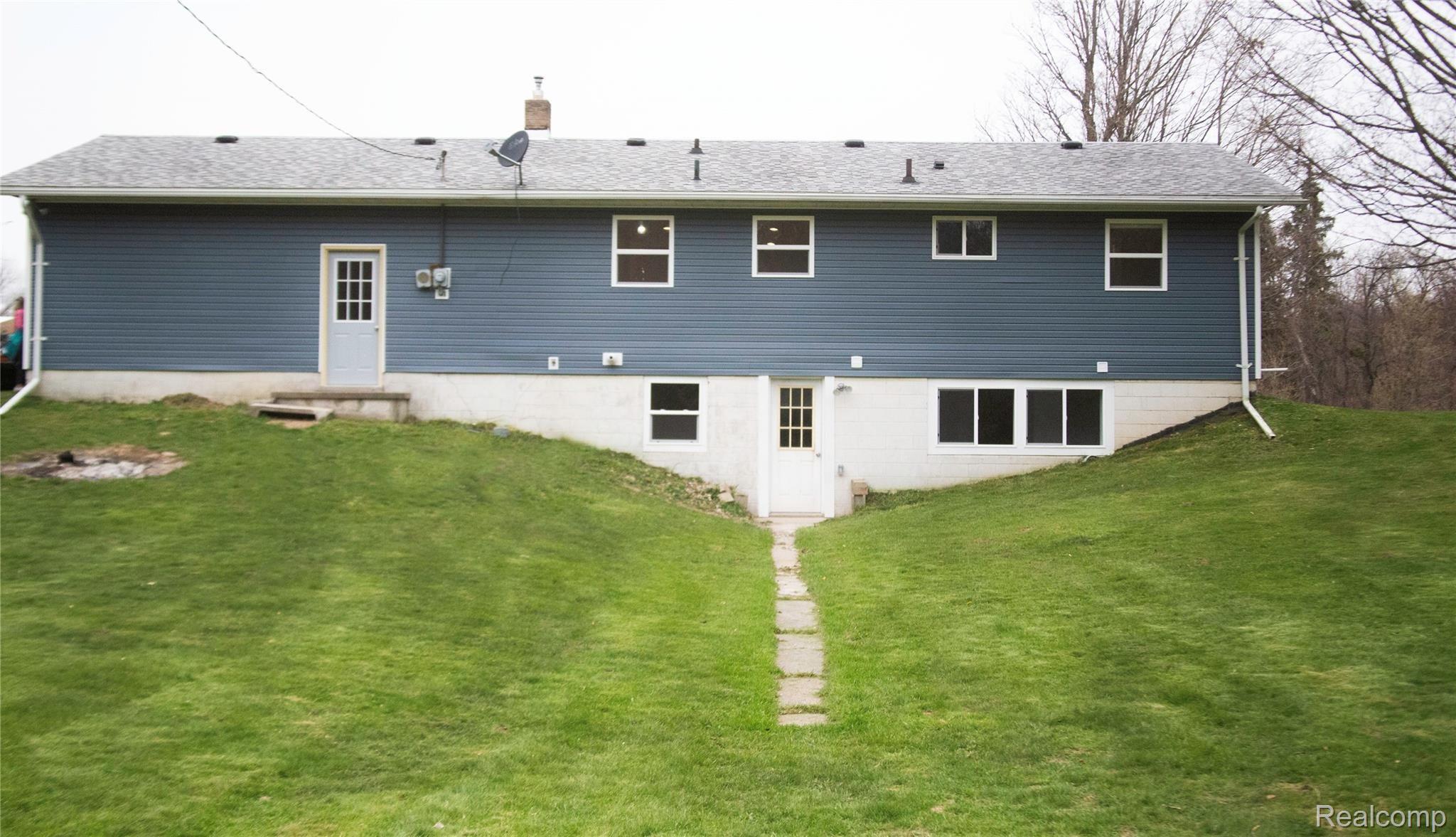 5925 Mason Road Fowlerville, MI 48836 - Photo 18 of 19 masonback of house2.jpg