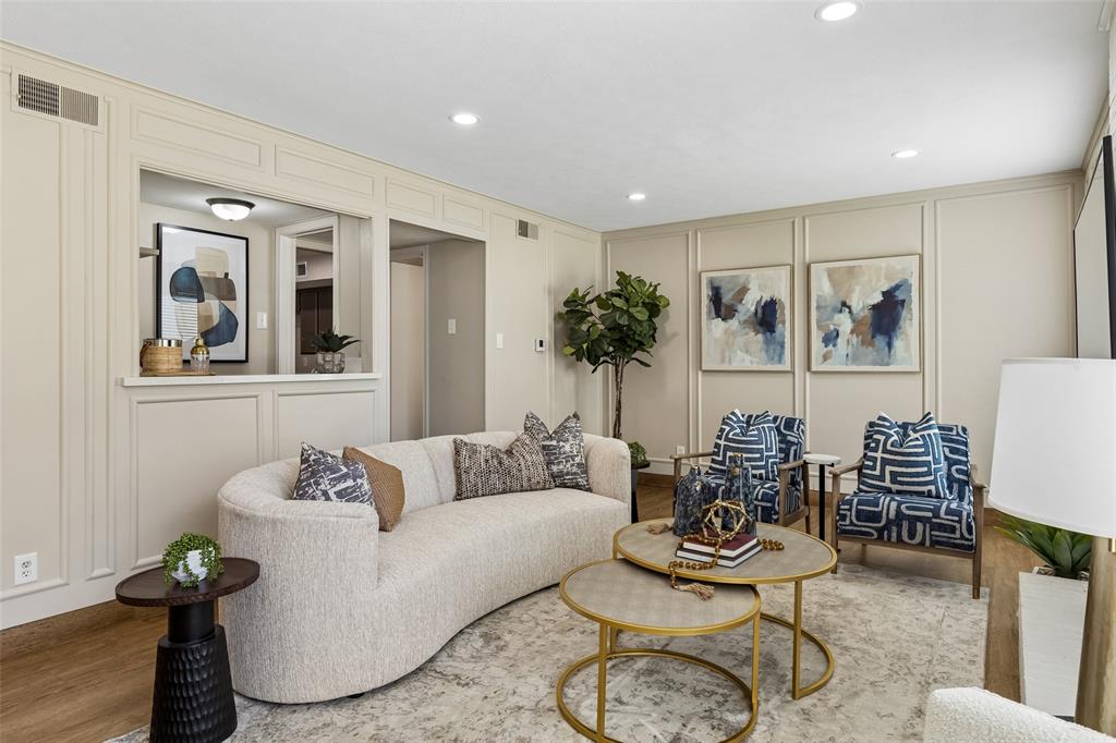 4962 Thunder Road Dallas, TX 75244 - Photo 14 of 26 Living area featuring recessed lighting,paneling, & a pass-through window to the wet bar.