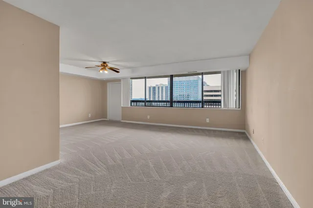 a bathroom with a sink toilet vanity and shower