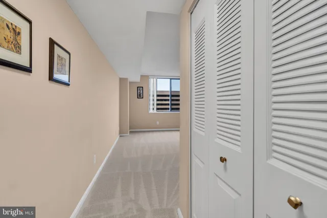 a bedroom with bed and flat screen tv