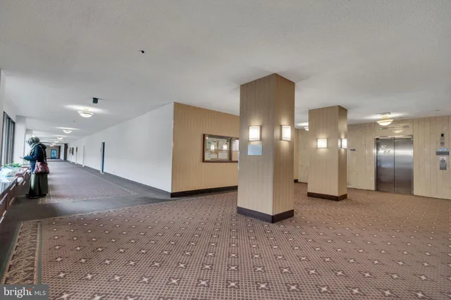 a view of a hallway with a room