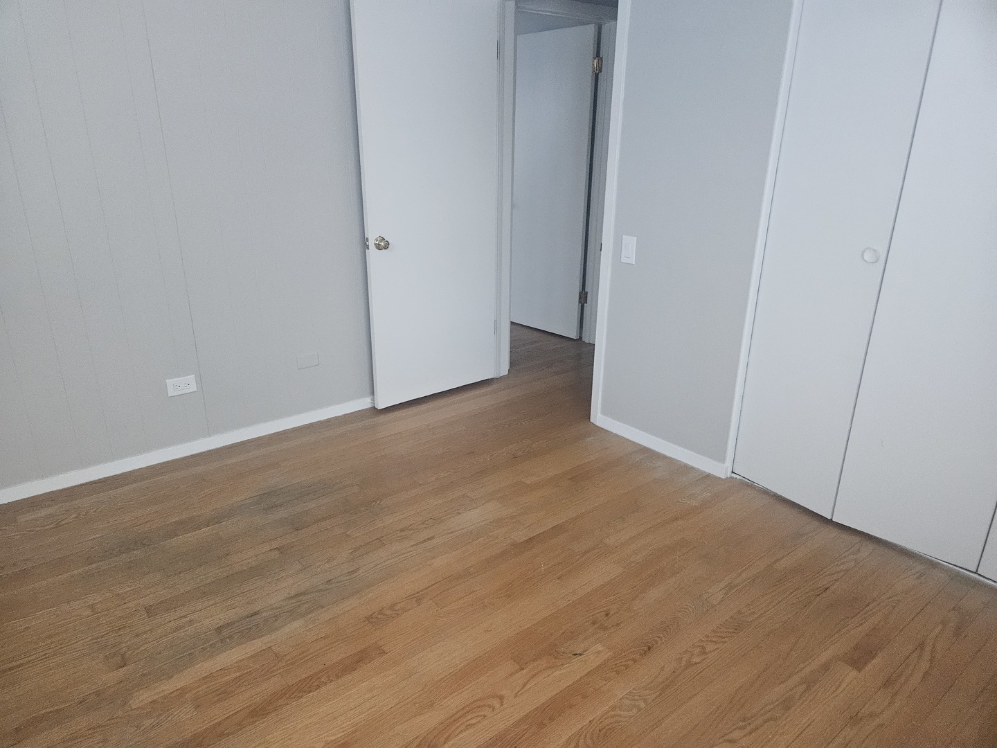 863 North Northwest Highway, Unit 2 Park Ridge, IL 60068 - Photo 14 of 22 a view of an empty room with wooden floor