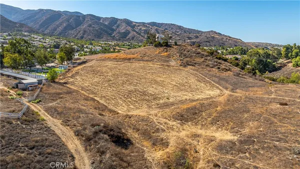 a view of a lake with mountains in the background
