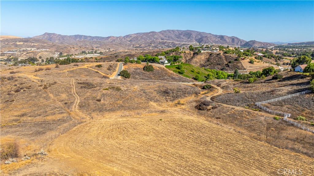 0 Knabe Road Corona, CA 92883 - Photo 20 of 23 a view of a lake with mountains in the background