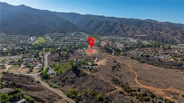 a view of top of a house with a mountain