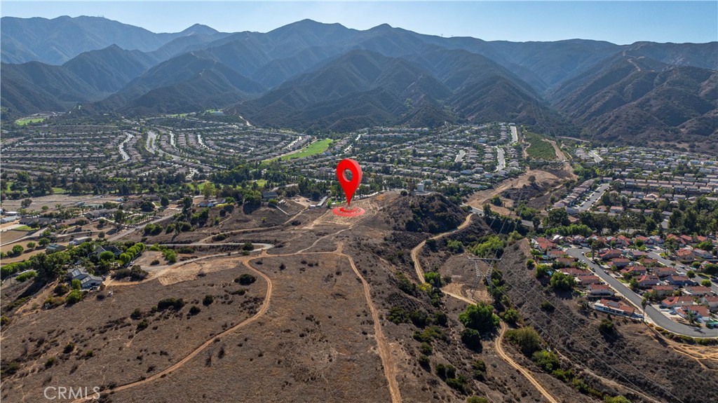 0 Knabe Road Corona, CA 92883 - Photo 4 of 23 a view of top of a house with a mountain