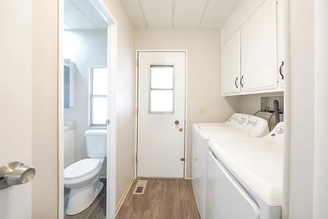 a bathroom with a toilet and a sink