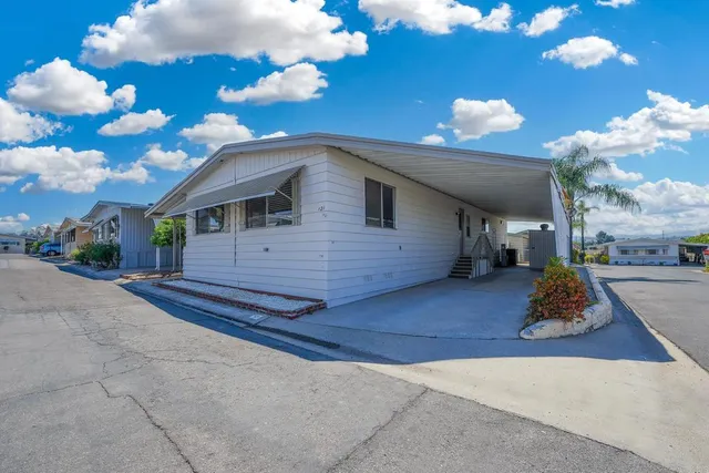 a view of a house with entertaining space