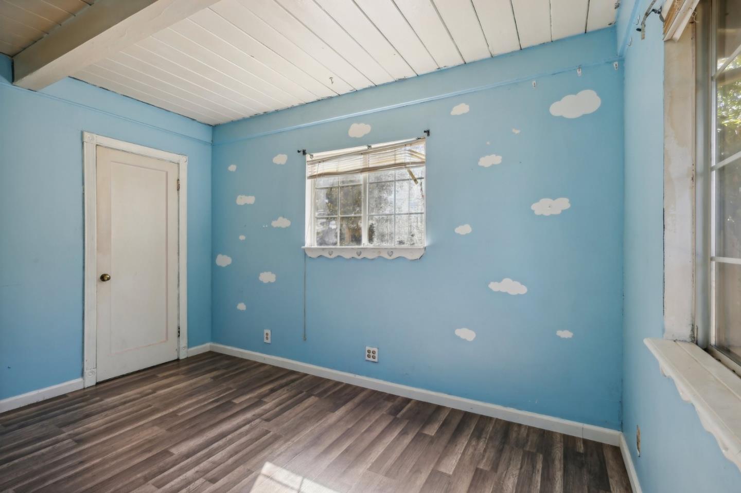 14769 Nelson Way San Jose, CA 95124 - Photo 15 of 43 a view of room with window and wooden floor