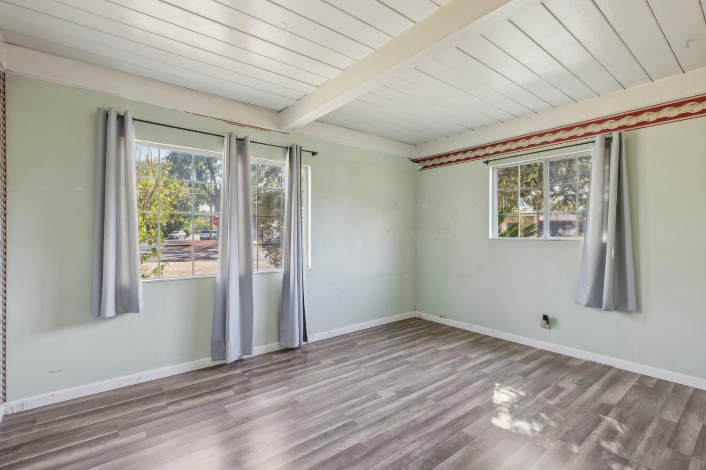 14769 Nelson Way San Jose, CA 95124 - Photo 16 of 43 a view of empty room with wooden floor and fan