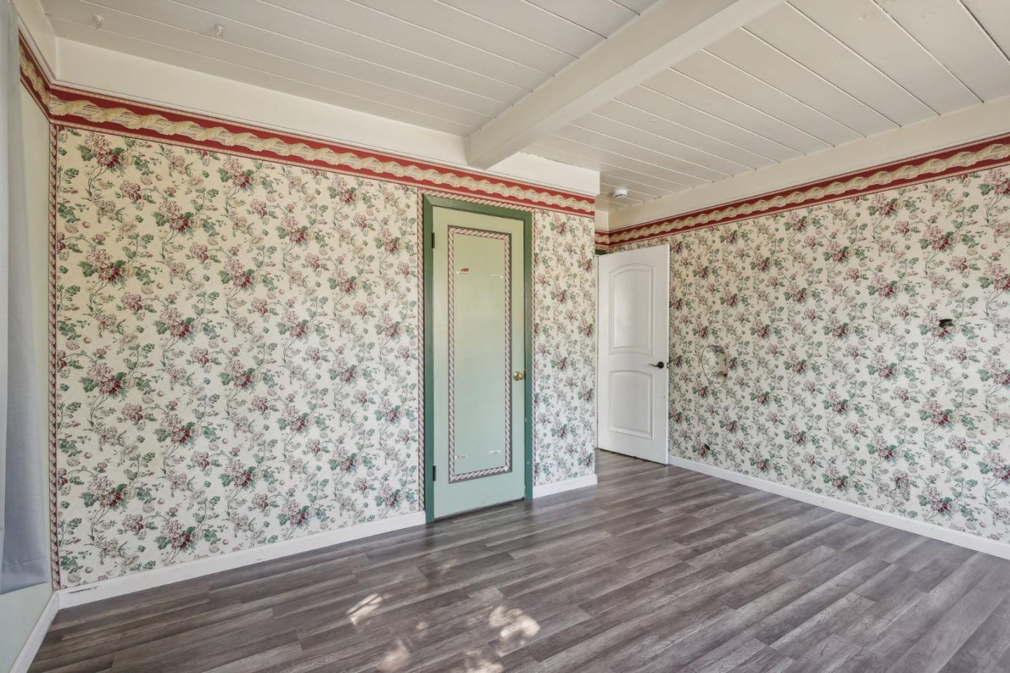 14769 Nelson Way San Jose, CA 95124 - Photo 18 of 43 a view of a big room with wooden floor and door in a room