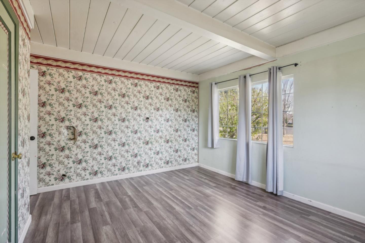 14769 Nelson Way San Jose, CA 95124 - Photo 19 of 43 a view of empty room with wooden floor and fan