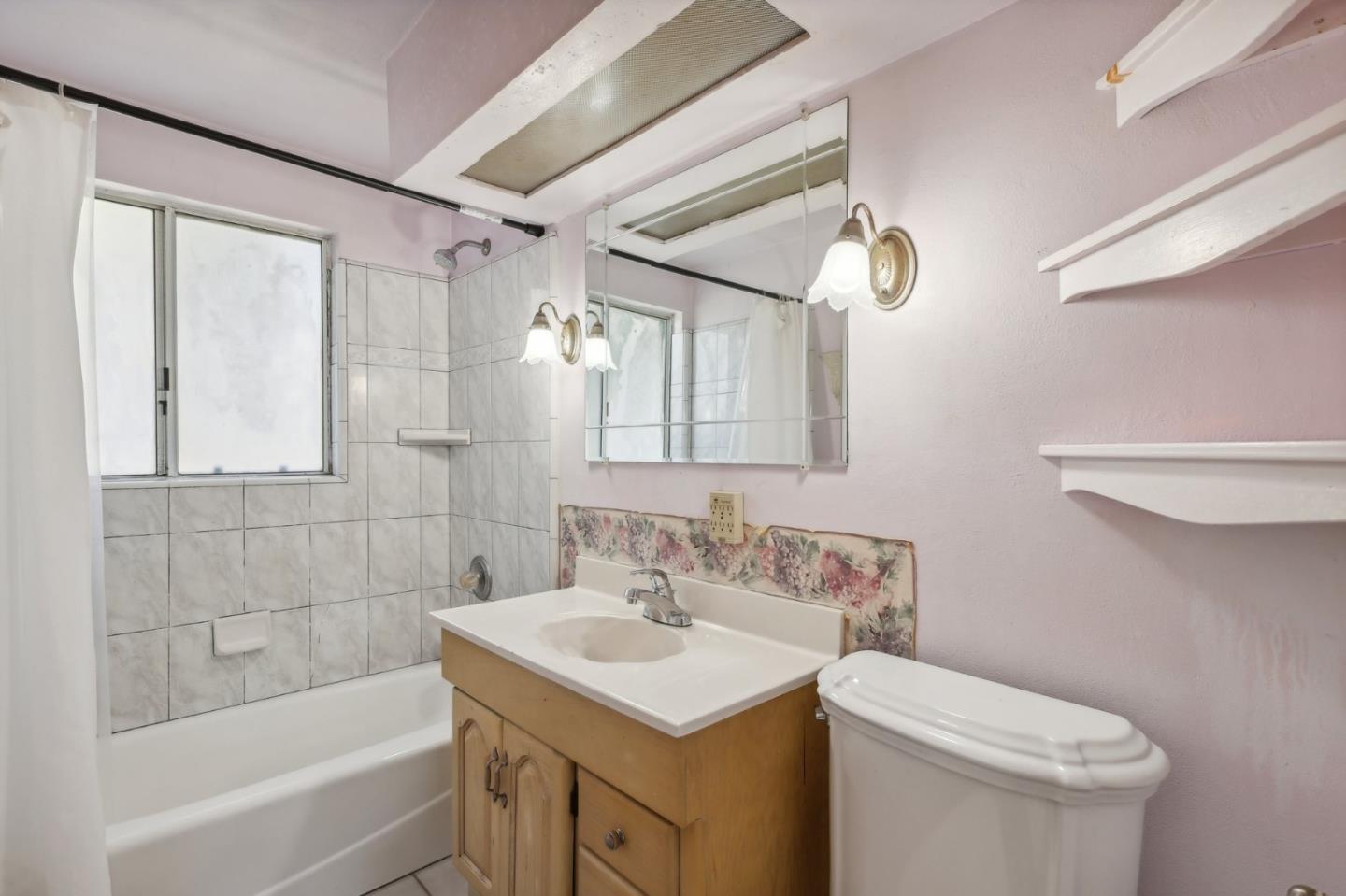 14769 Nelson Way San Jose, CA 95124 - Photo 20 of 43 a bathroom with a sink toilet vanity and bathtub