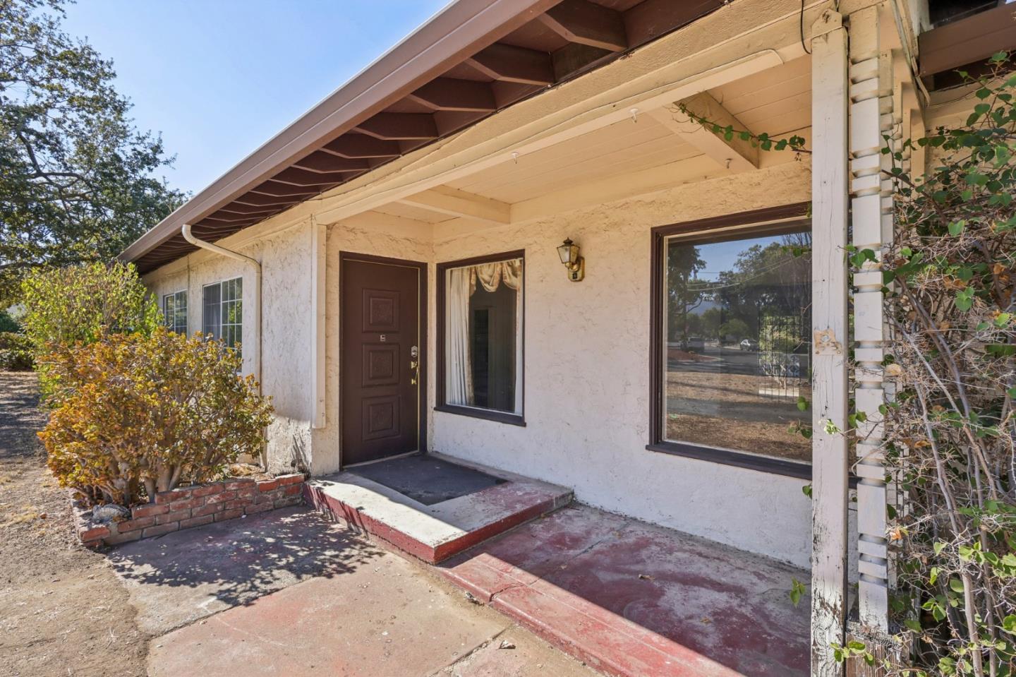 14769 Nelson Way San Jose, CA 95124 - Photo 2 of 43 a front view of a house with a yard