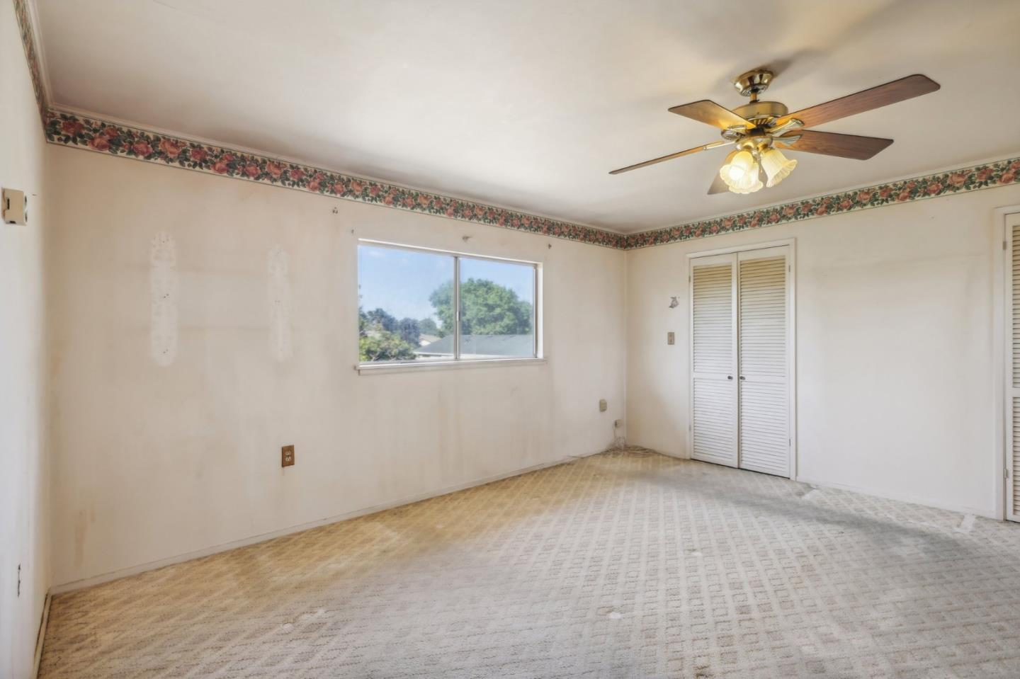 14769 Nelson Way San Jose, CA 95124 - Photo 22 of 43 a view of an empty room with a window