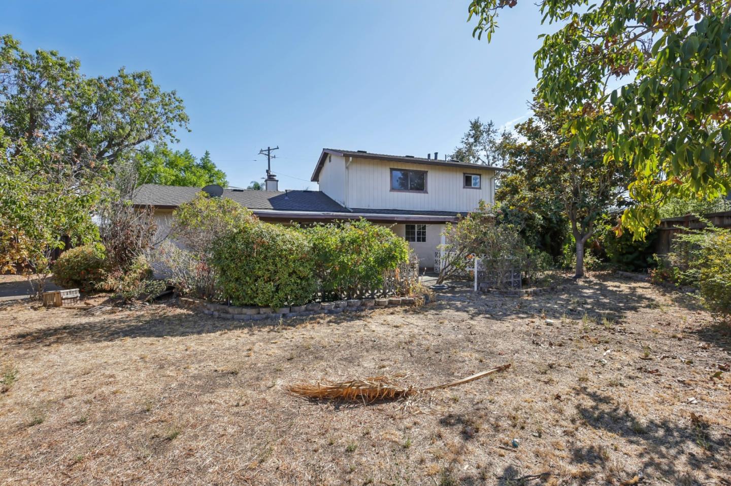 14769 Nelson Way San Jose, CA 95124 - Photo 28 of 43 a view of a house with a yard and large tree