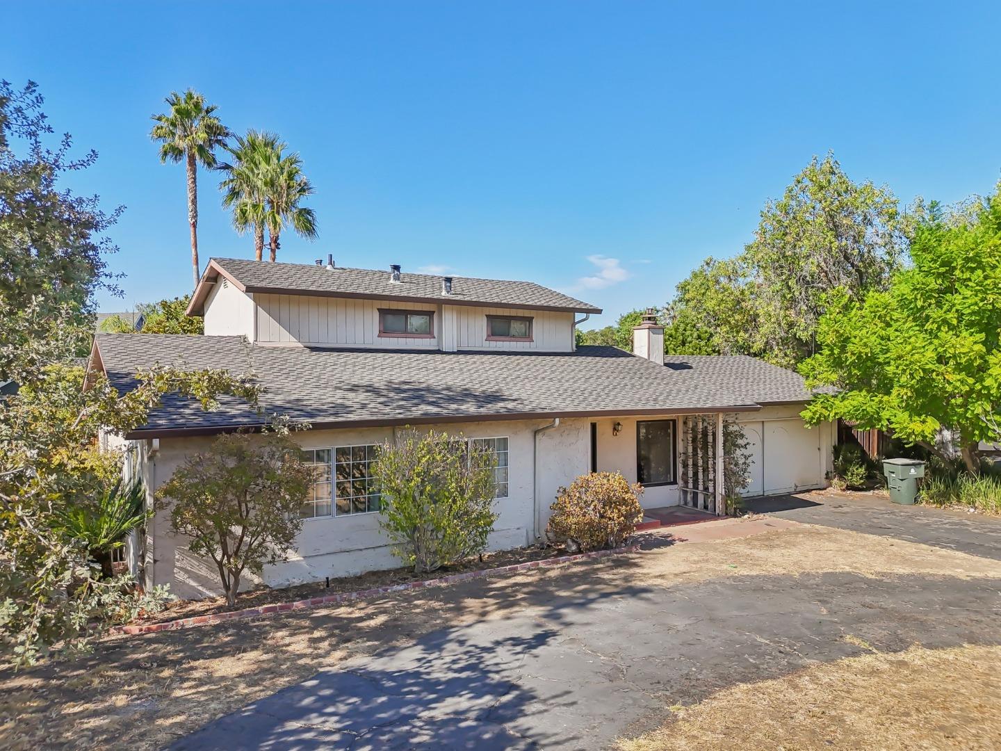 14769 Nelson Way San Jose, CA 95124 - Photo 31 of 43 a front view of a house with a garden