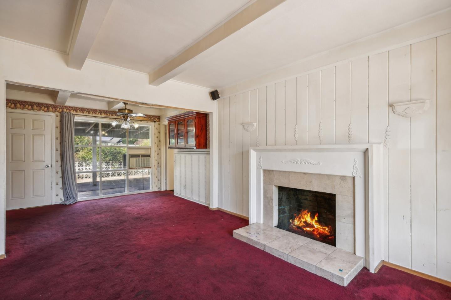 14769 Nelson Way San Jose, CA 95124 - Photo 5 of 43 a living room with furniture and a fireplace