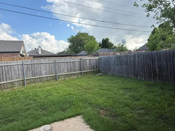 a view of a backyard with a garden