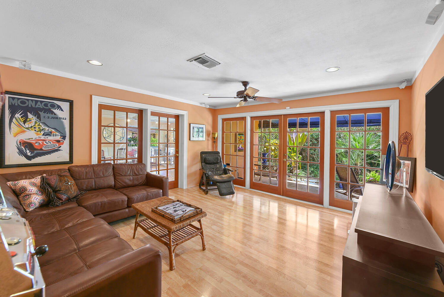 708 Northwest 6th Drive Boca Raton, FL 33486 - Photo 11 of 31 a living room with furniture two large windows and wooden floor