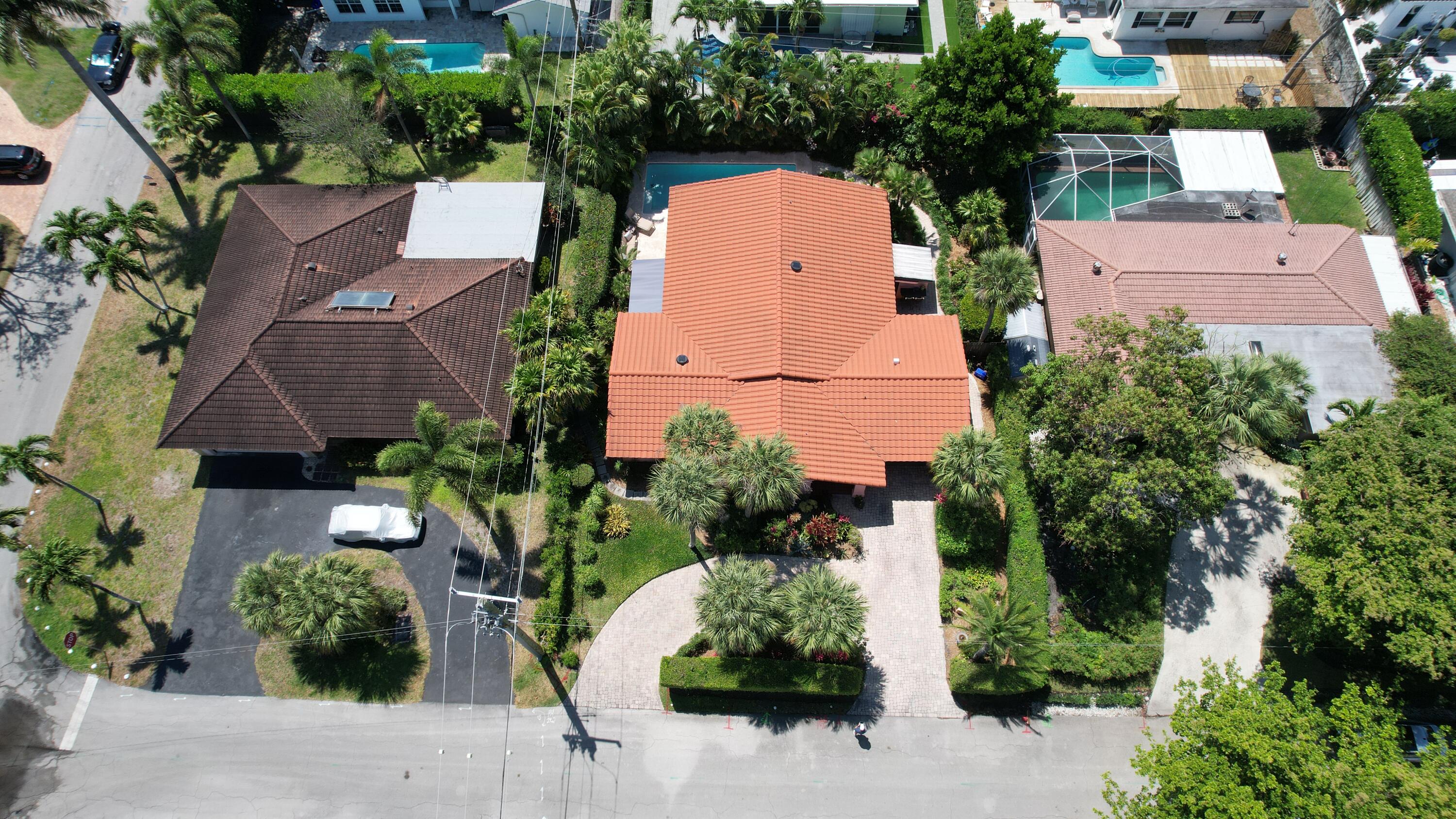 708 Northwest 6th Drive Boca Raton, FL 33486 - Photo 29 of 31 an aerial view of multiple houses with yard