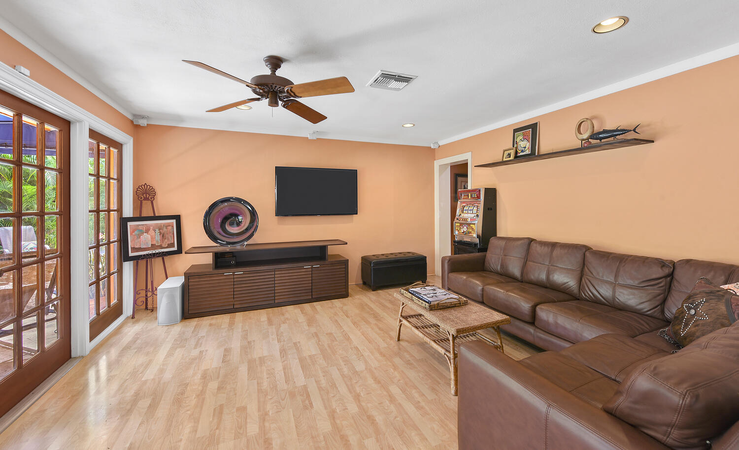 708 Northwest 6th Drive Boca Raton, FL 33486 - Photo 9 of 31 a living room with furniture and a flat screen tv