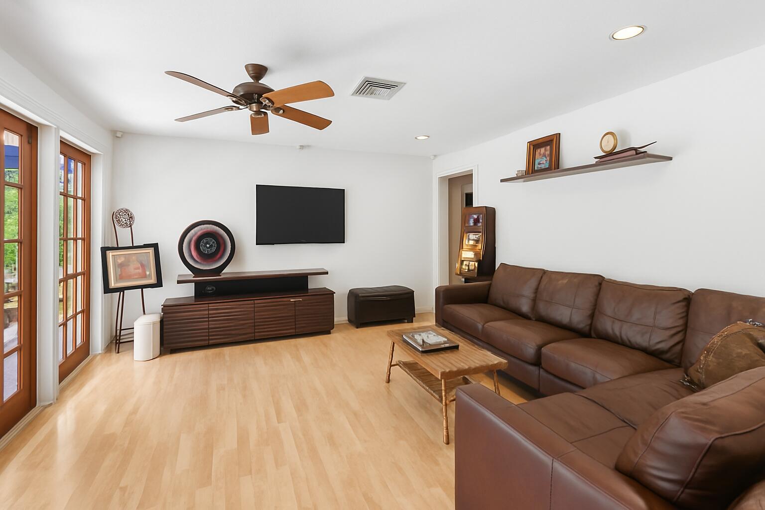 708 Northwest 6th Drive Boca Raton, FL 33486 - Photo 10 of 31 a bedroom with furniture and a ceiling fan