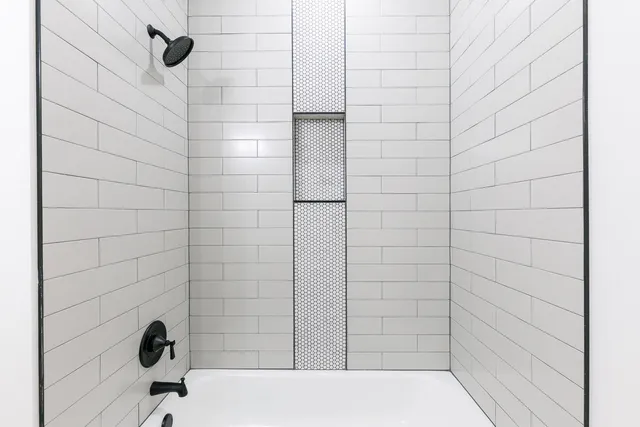 a bathroom with a bathtub